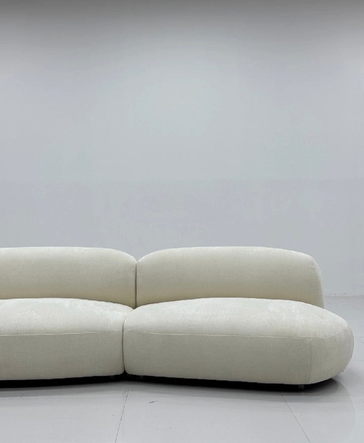 Home Atelier Casper Performance Boucle Sectional Curve Sofa
