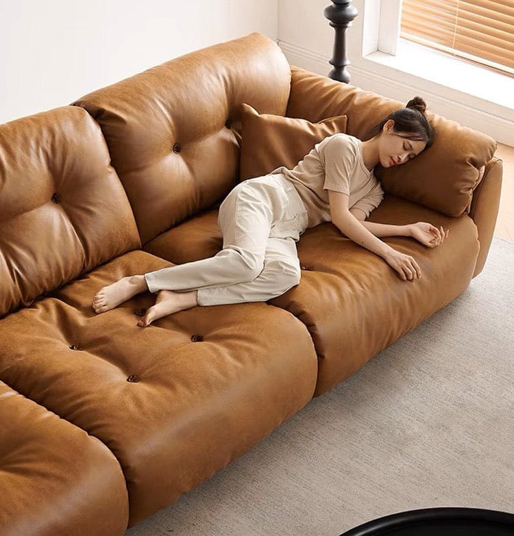 Home Atelier Elvin Scratch Resistant Backrest Slider Leather Sofa