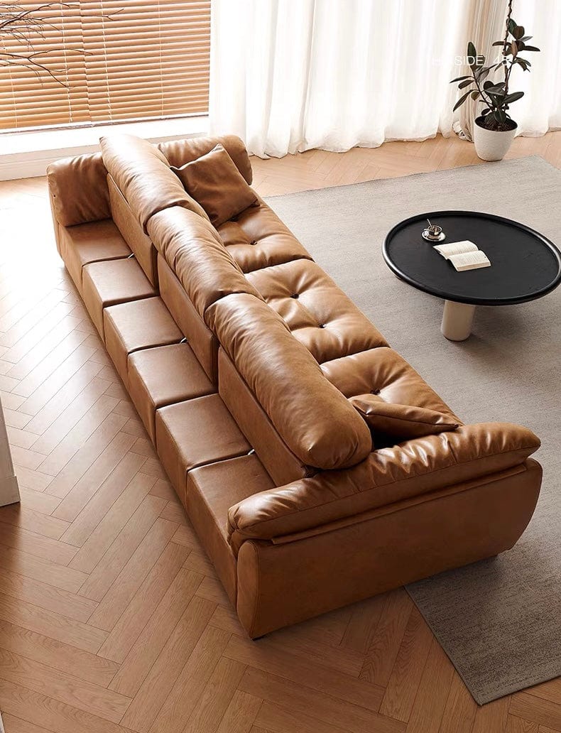 Home Atelier Elvin Scratch Resistant Backrest Slider Leather Sofa