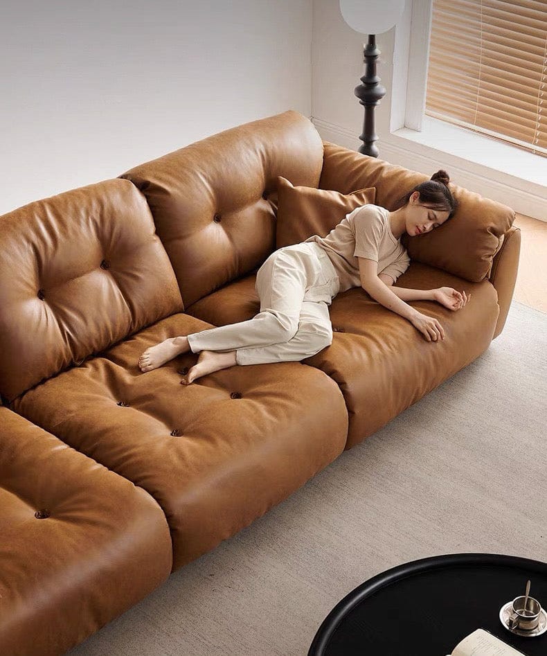 Home Atelier Elvin Scratch Resistant Backrest Slider Leather Sofa